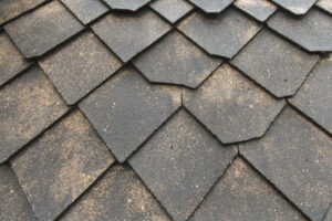 Curling roof shingle